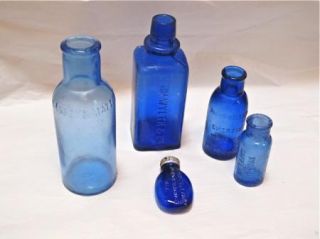 1890s 00s Cobalt Blue Embossed Bottles with One Small Flask Type
