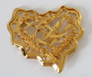 Elegant Christian Lacroix Goldtone Modernist Heart Pin