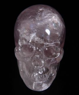 This is a Amethyst skull. Its 2.4 inches long from front to back.