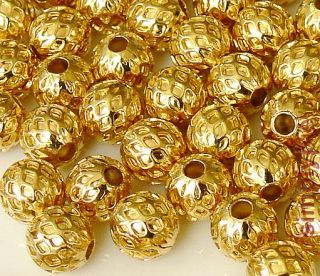 Beautiful quality metal beads, plated in gold over brass. Hole size