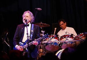 Mickey Hart (in background, playing drums) and Bob Weir (playing