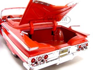 Brand new 1:18 scale diecast 1960 Chevy Impala by Motormax.