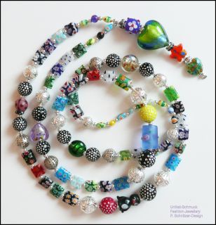 Die Perlen sind auf reißfestem, nylonummandeltem Juwelierschmuckdraht